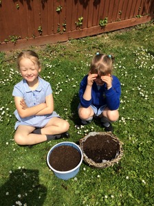 Getting our pots ready for planting